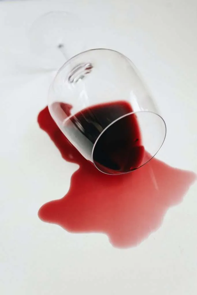 remove wine stains from carpet or clothing